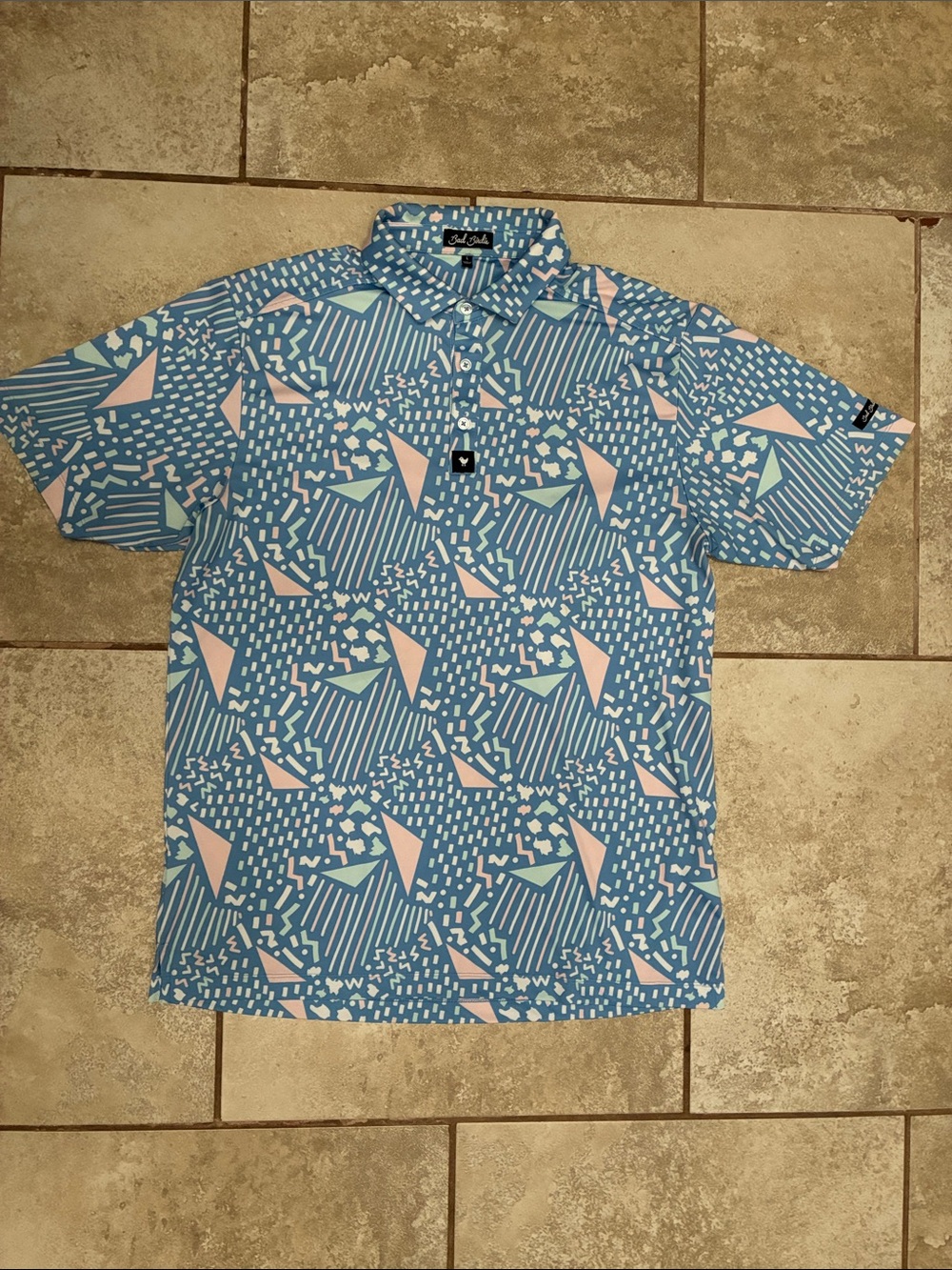 Bad Birdie Sky Blue Polo with Pink Geometric Accents
